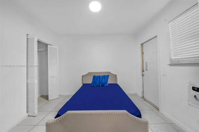 a view of a hallway with closet