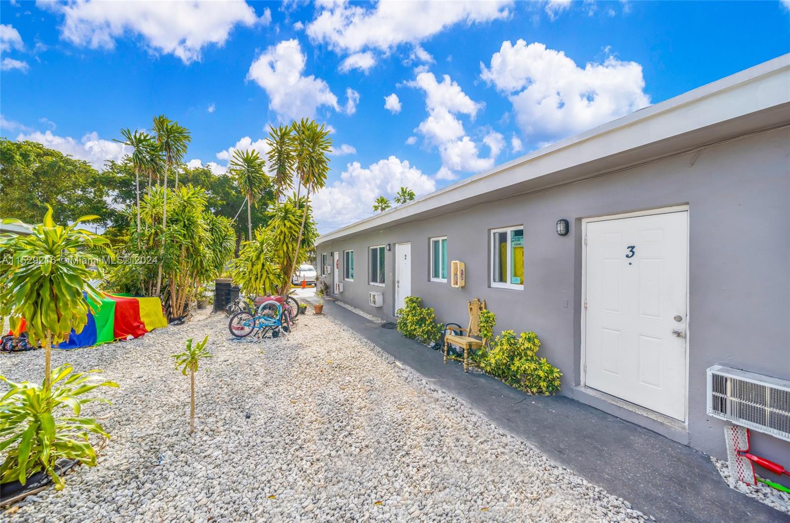 1219 Sharazad Boulevard Opa-Locka, FL 33054 - Photo 5 of 16 a view of a house with a patio