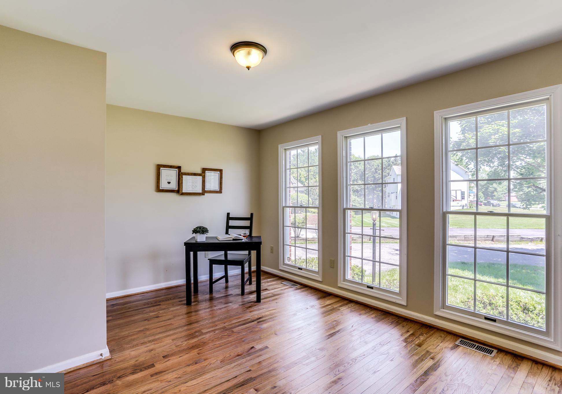 8258 Spring Branch Court Laurel, MD 20723 - Photo 13 of 26 a view of a livingroom with furniture