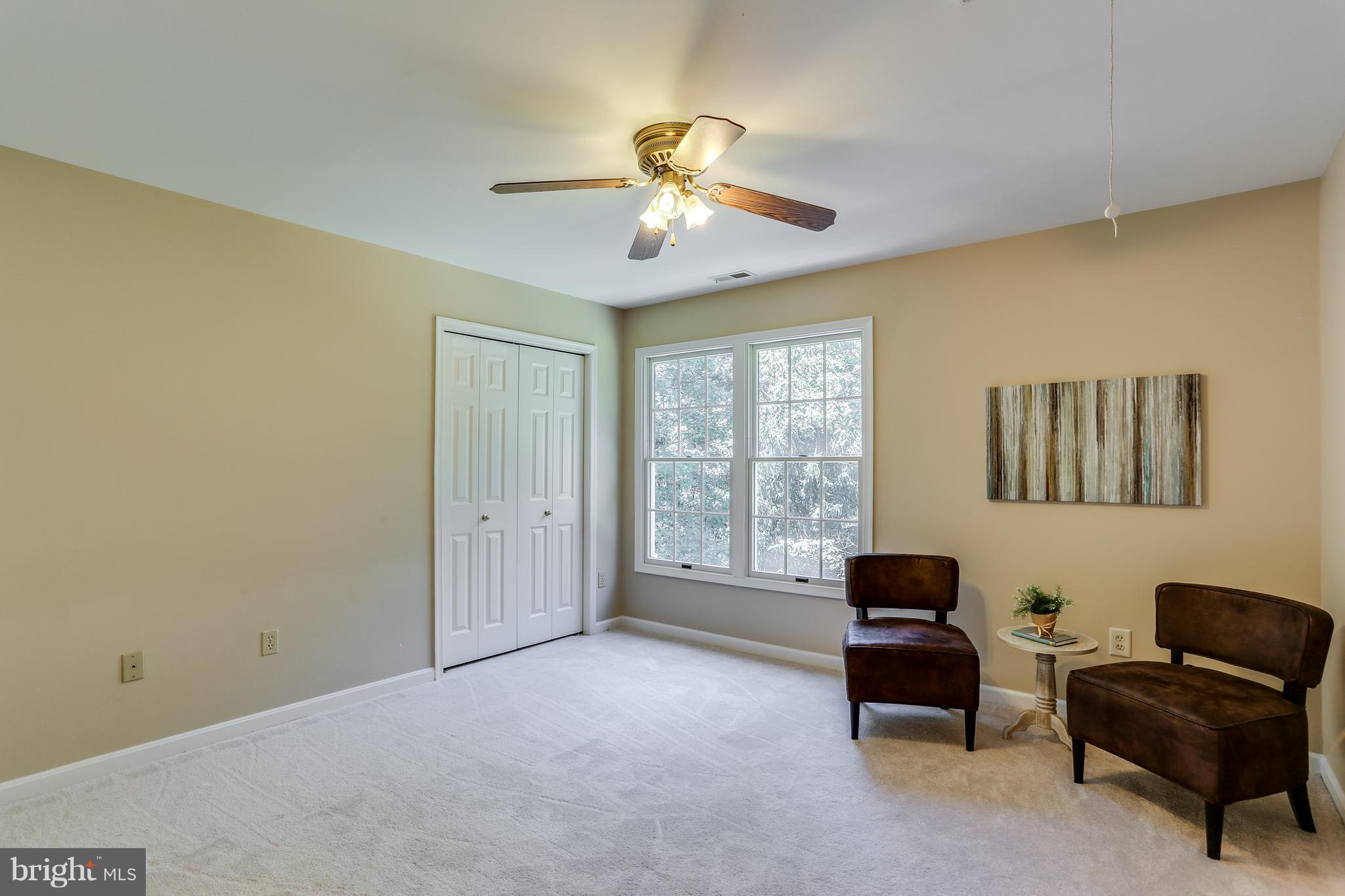 8258 Spring Branch Court Laurel, MD 20723 - Photo 21 of 26 a living room with furniture and a window