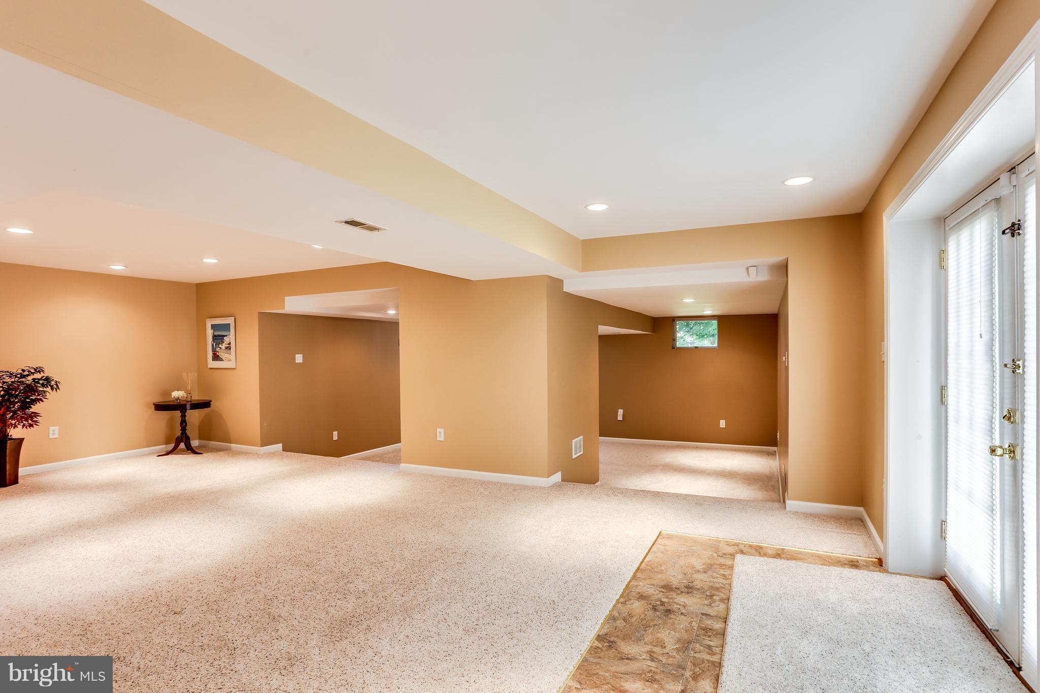 8258 Spring Branch Court Laurel, MD 20723 - Photo 22 of 26 a view of a livingroom with a staircase