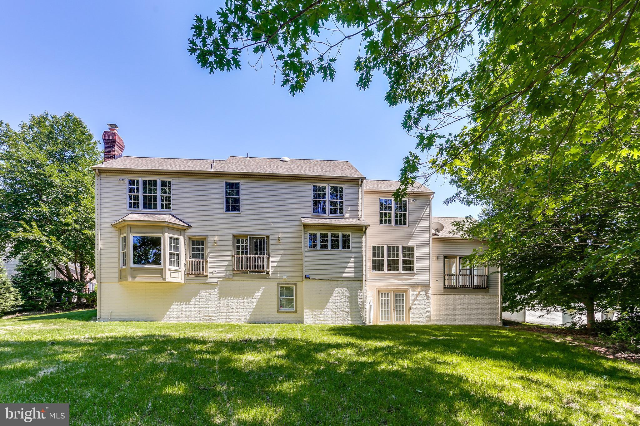 8258 Spring Branch Court Laurel, MD 20723 - Photo 26 of 26 a front view of a house with a yard