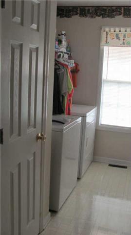 80 Maple Road Huntland, TN 37345 - Photo 11 of 12 Large utility room gives extra room for a freezer etc.