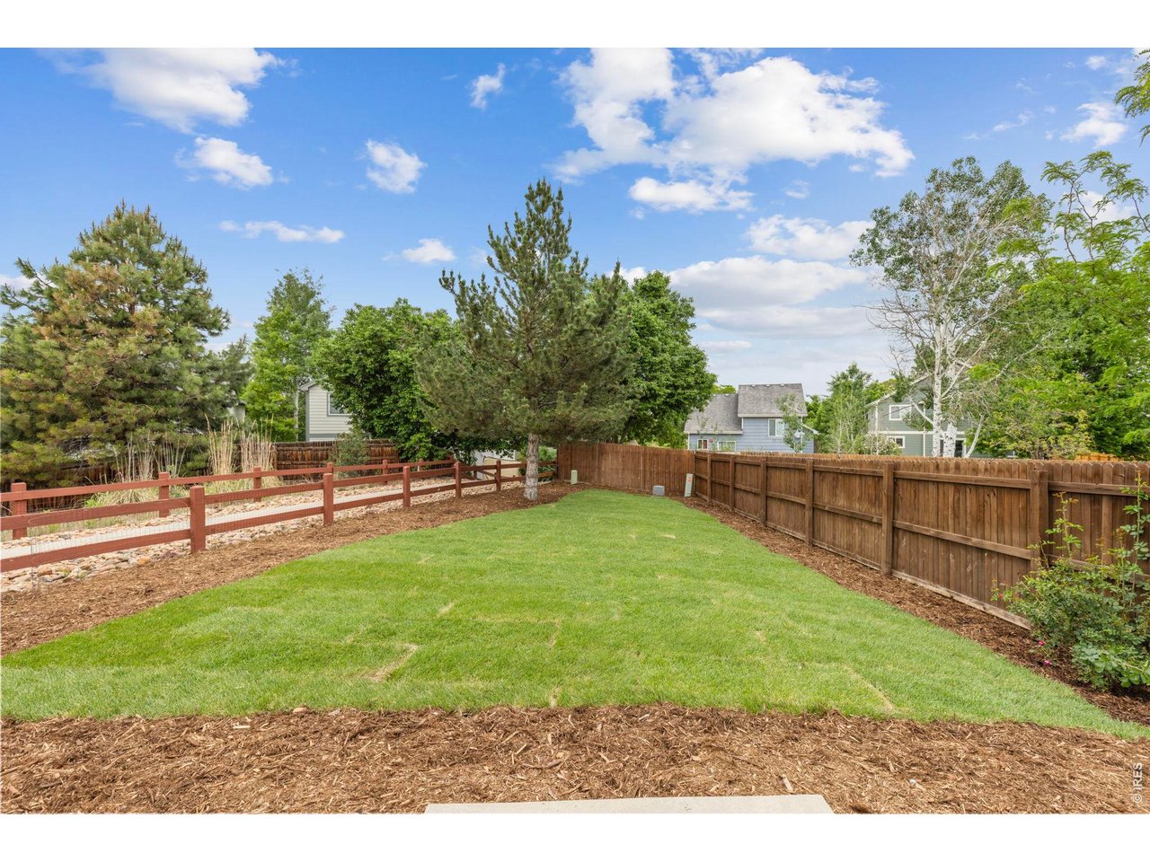 6531 St Vrain Ranch Boulevard Firestone, CO 80504 - Photo 23 of 30 a view of a backyard