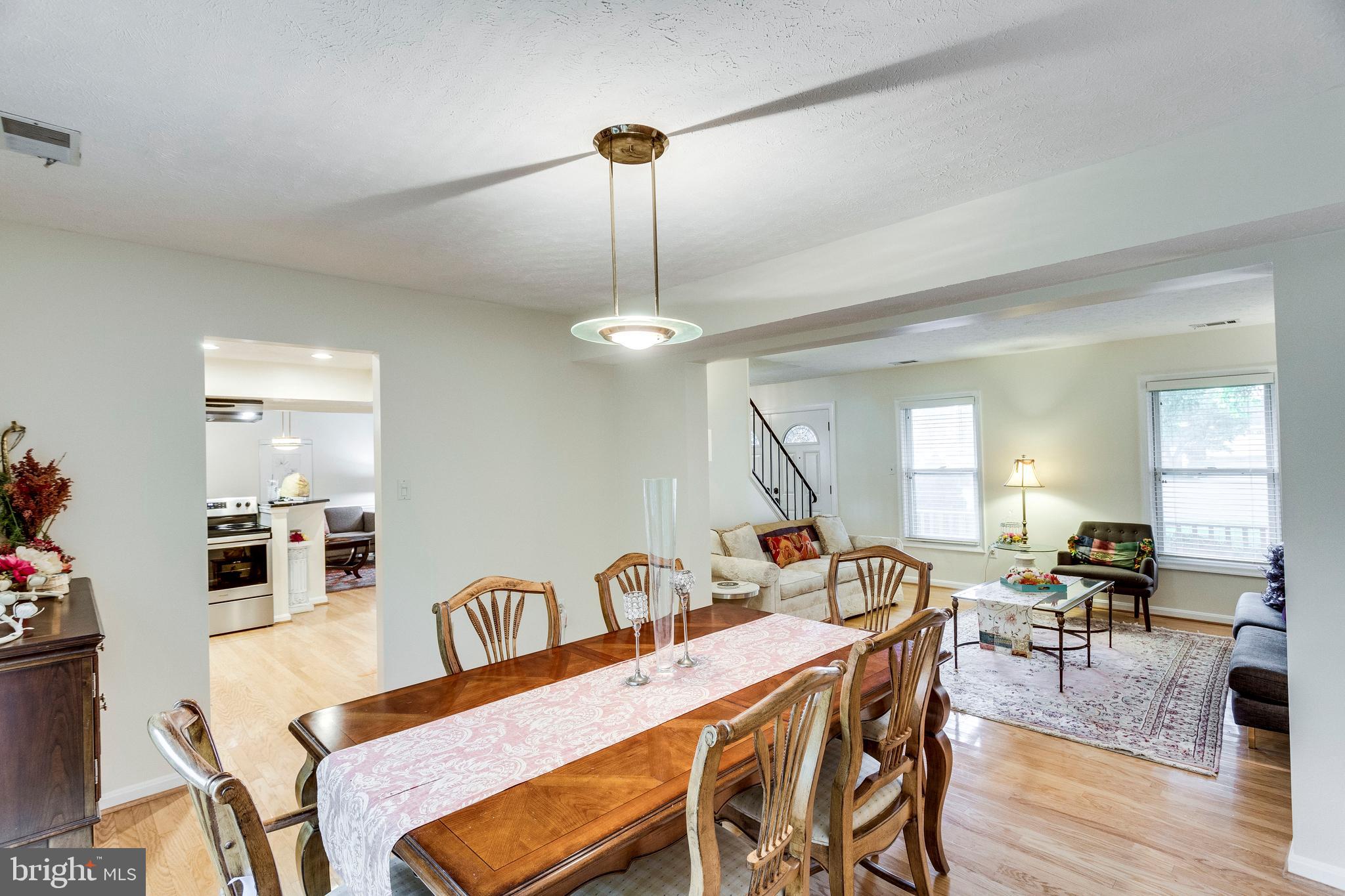 13203 Jasper Road Fairfax, VA 22033 - Photo 9 of 38 Open Flow Between Dining Room and Living Room