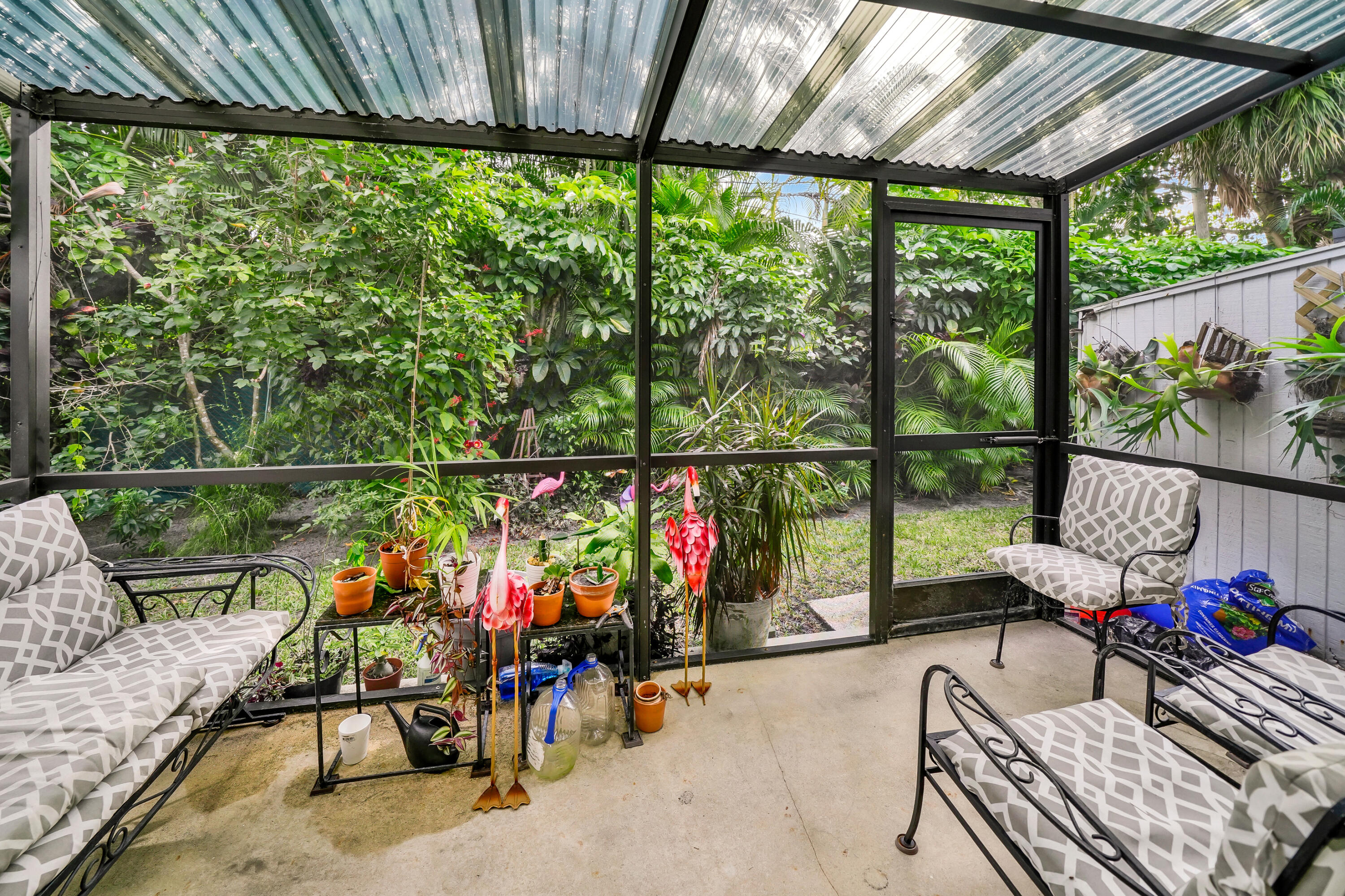 3110 Surf Way, Unit 2 Singer Island, FL 33404 - Photo 15 of 15 a view of an outdoor sitting area