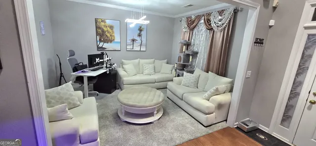 a living room with furniture and a window