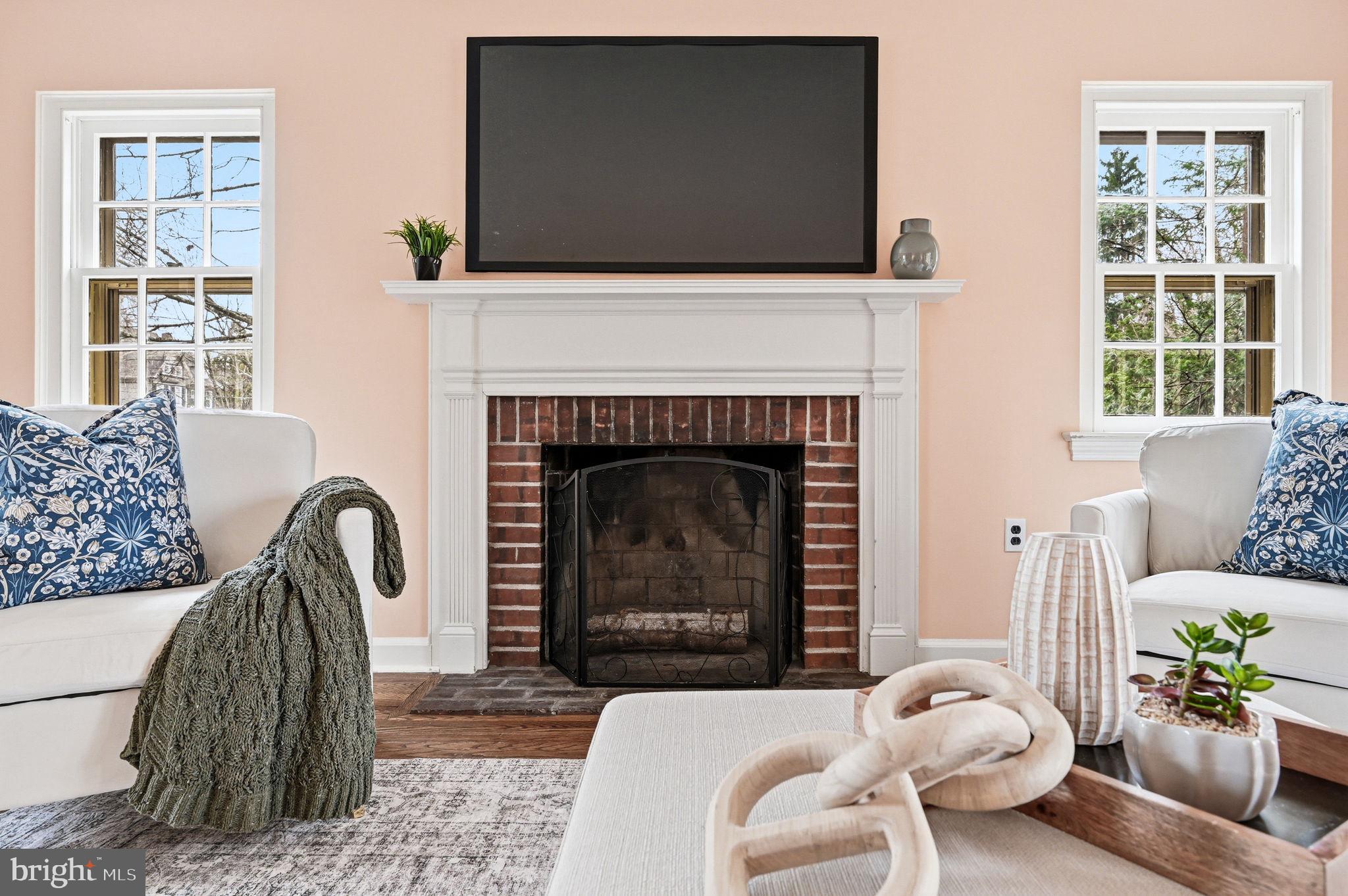 218 Vassar Avenue Swarthmore, PA 19081 - Photo 5 of 41 Wood burning fireplace centers living room
