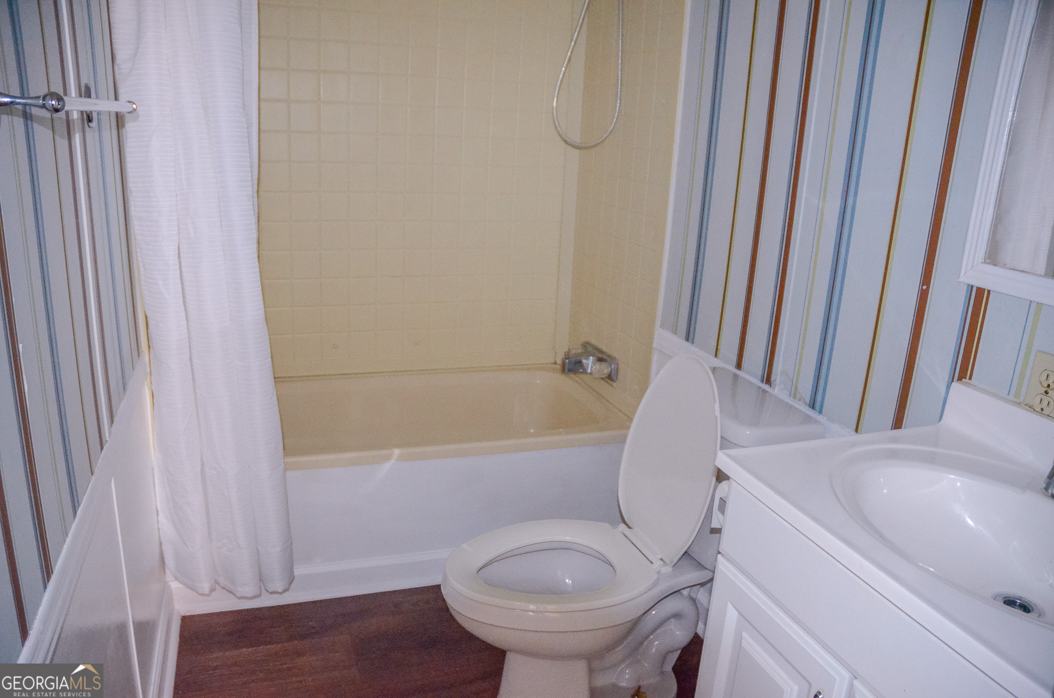 2055 Payne Pond Road Weston, GA 31832 - Photo 13 of 20 a bathroom with a sink a toilet and bathtub