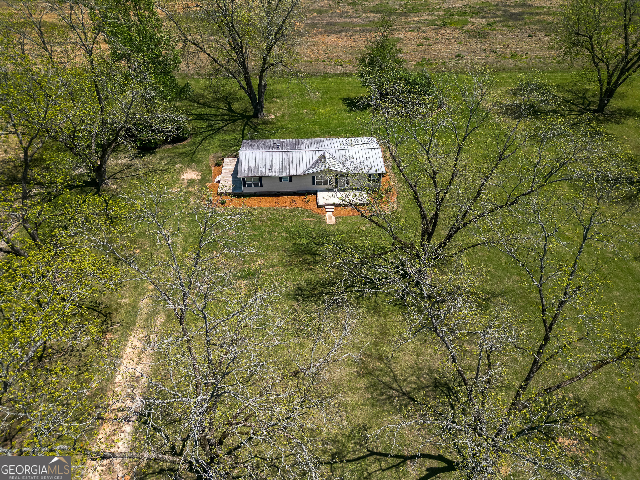 2055 Payne Pond Road Weston, GA 31832 - Photo 18 of 20 a view of a house with a yard