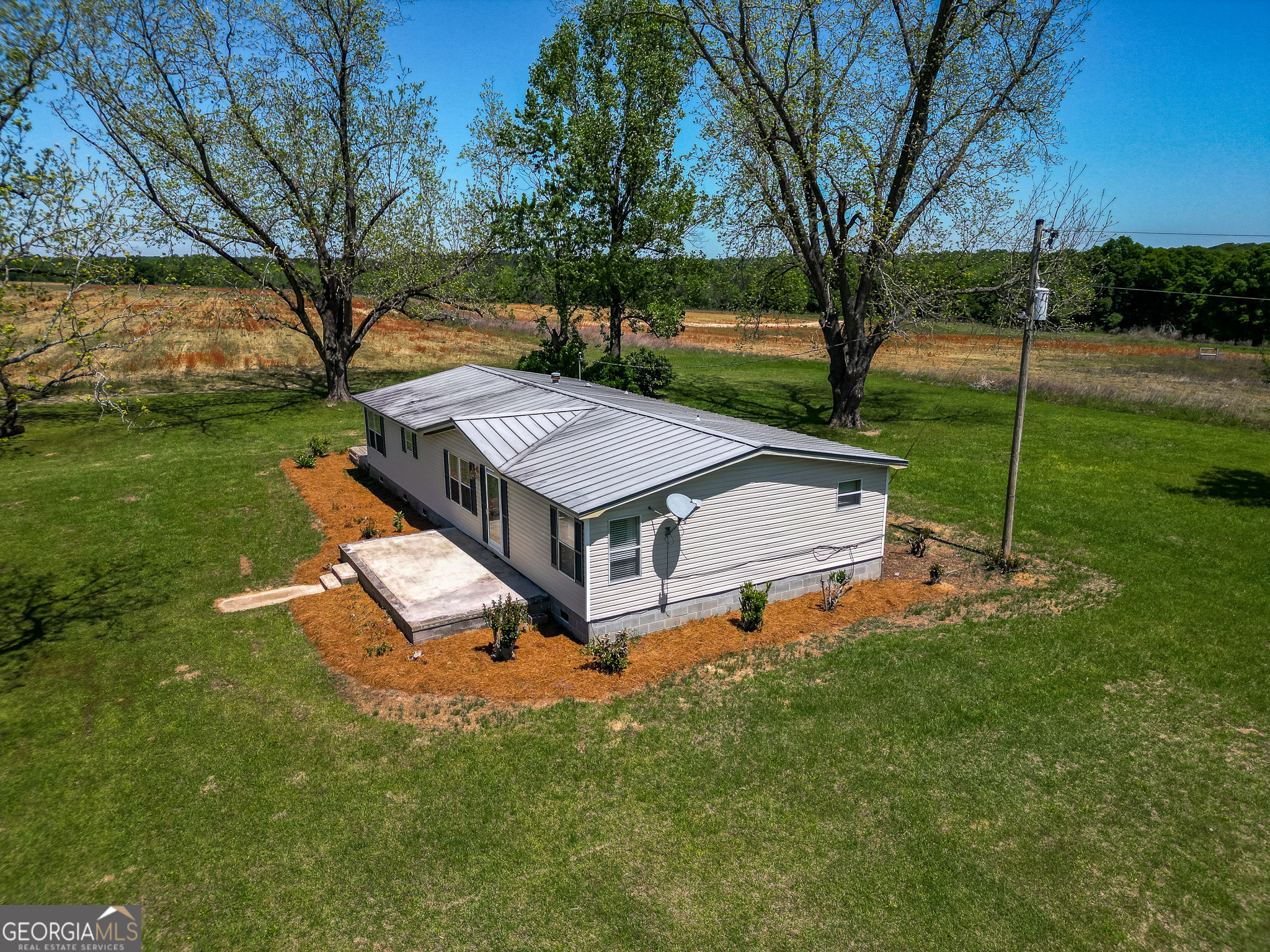 2055 Payne Pond Road Weston, GA 31832 - Photo 20 of 20 a aerial view of a house with pool and a big yard