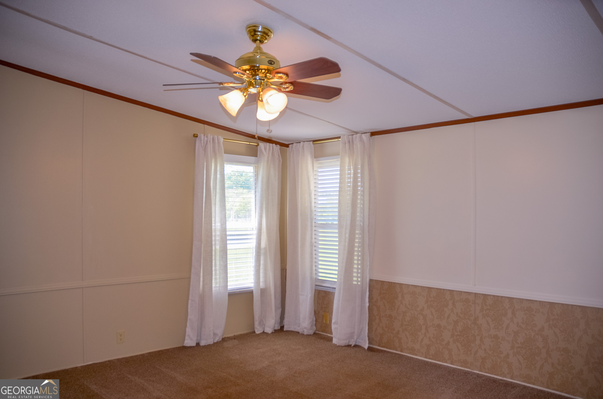 2055 Payne Pond Road Weston, GA 31832 - Photo 9 of 20 a view of an empty room with a window