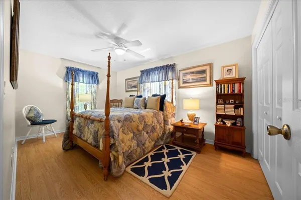 a bedroom with a bed and furniture