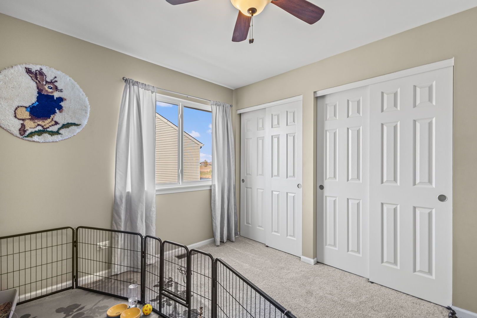 26832 West Hemlock Road Channahon, IL 60410 - Photo 15 of 25 a view of a hallway with a lots of frames on wall