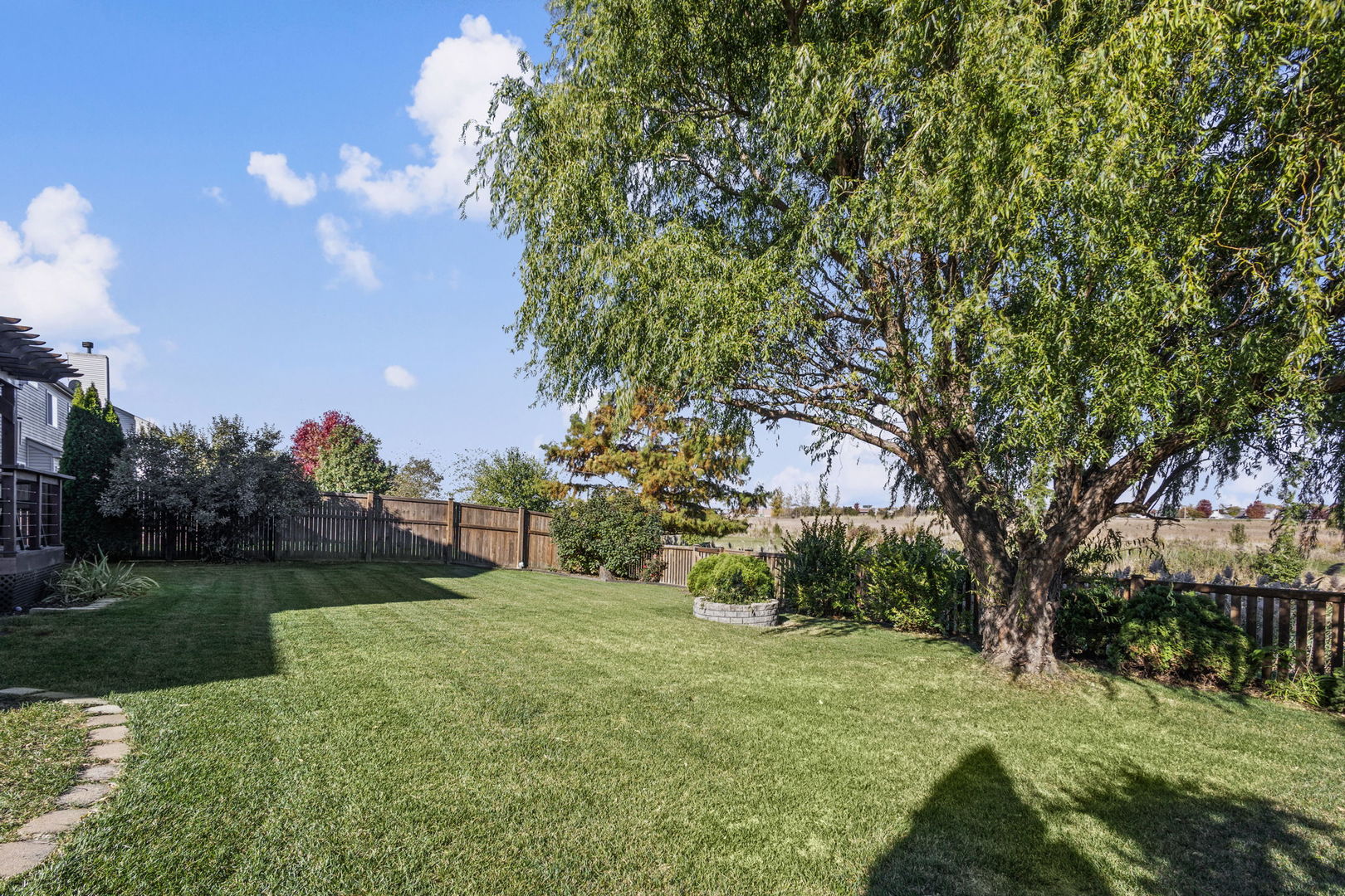 26832 West Hemlock Road Channahon, IL 60410 - Photo 24 of 25 a view of a garden with a tree