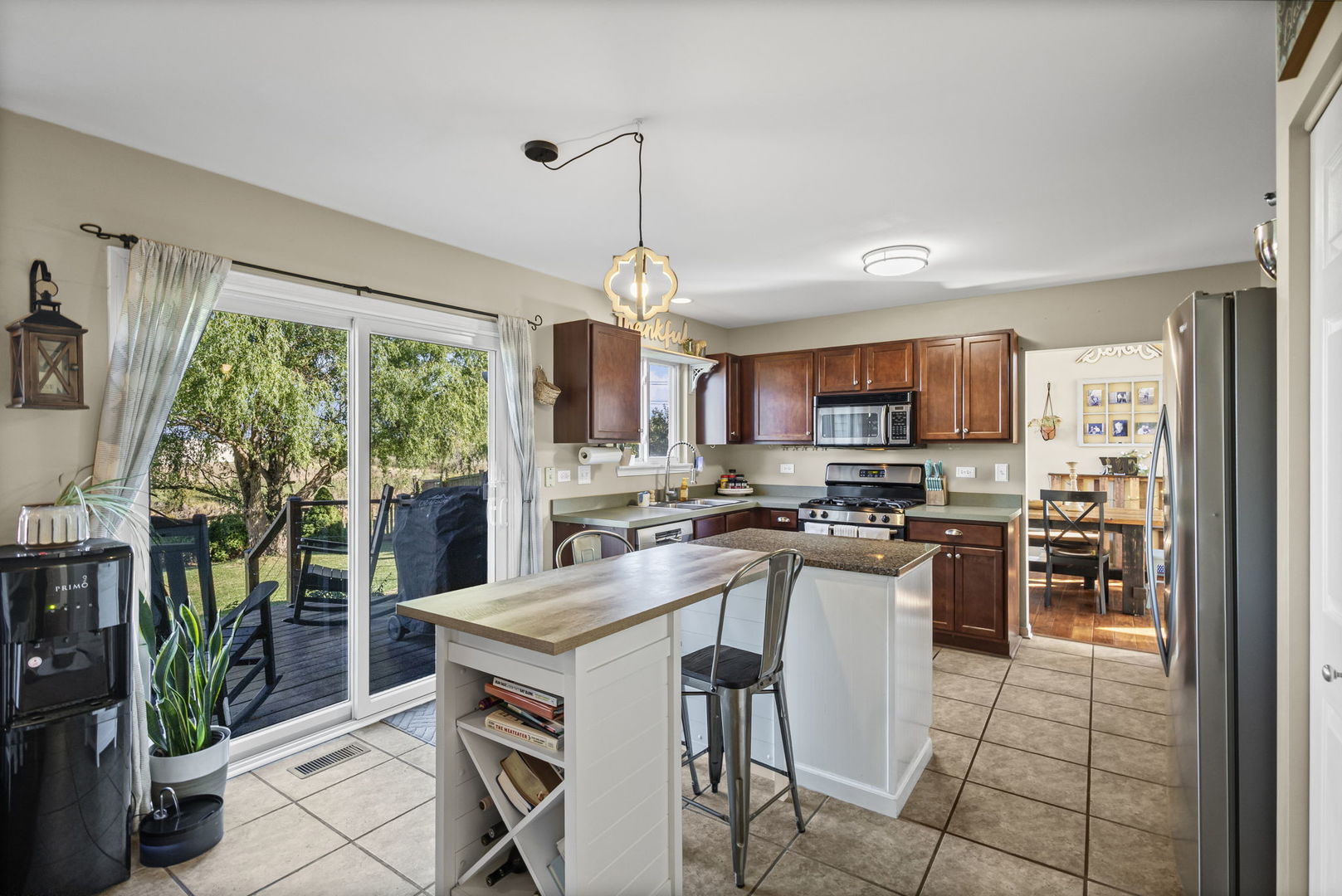 26832 West Hemlock Road Channahon, IL 60410 - Photo 9 of 25 a kitchen that has a lot of cabinets a sink and appliances