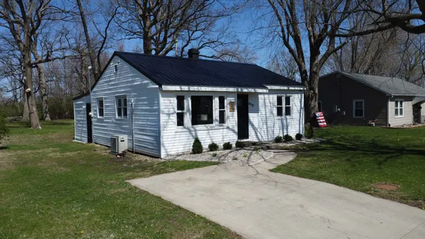 front view of house with a yard