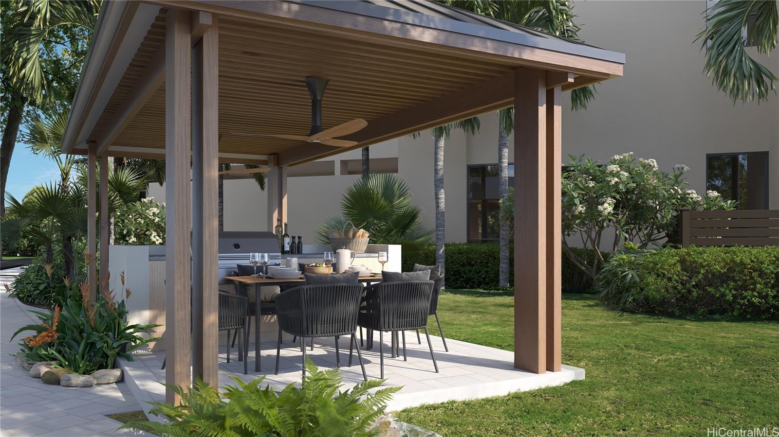 2599 Kapiolani Boulevard, Unit 2817 Honolulu, HI 96826 - Photo 13 of 25 a patio with table and chairs potted plants and floor to ceiling window