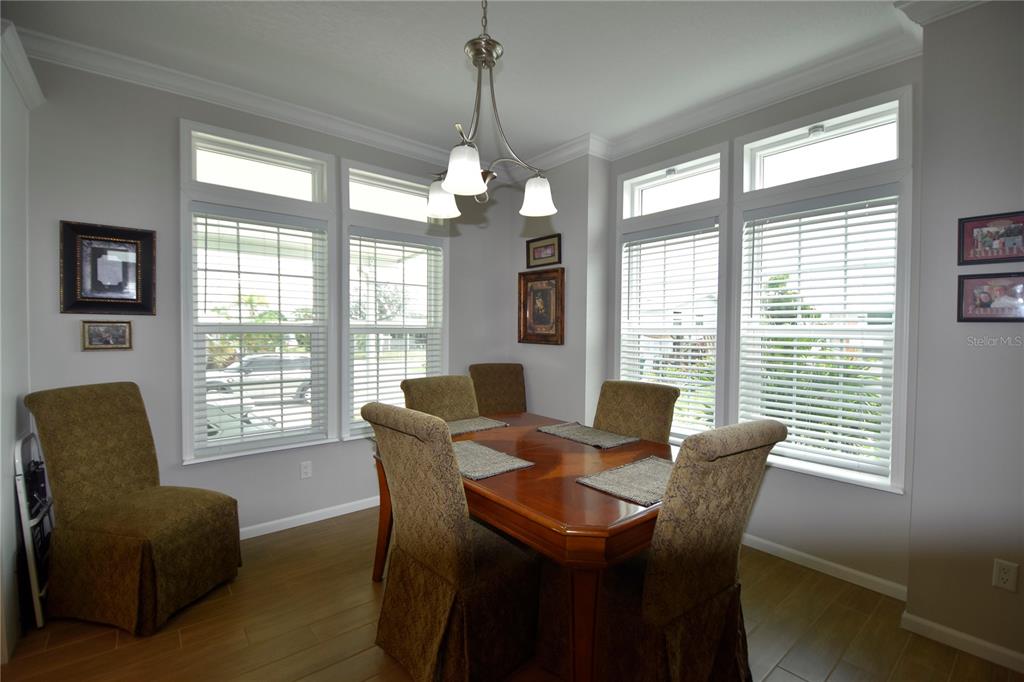 4354 North Manatee Loop, Unit 16A Punta Gorda, FL 33980 - Photo 18 of 33 a view of a dining room with furniture window and outside view