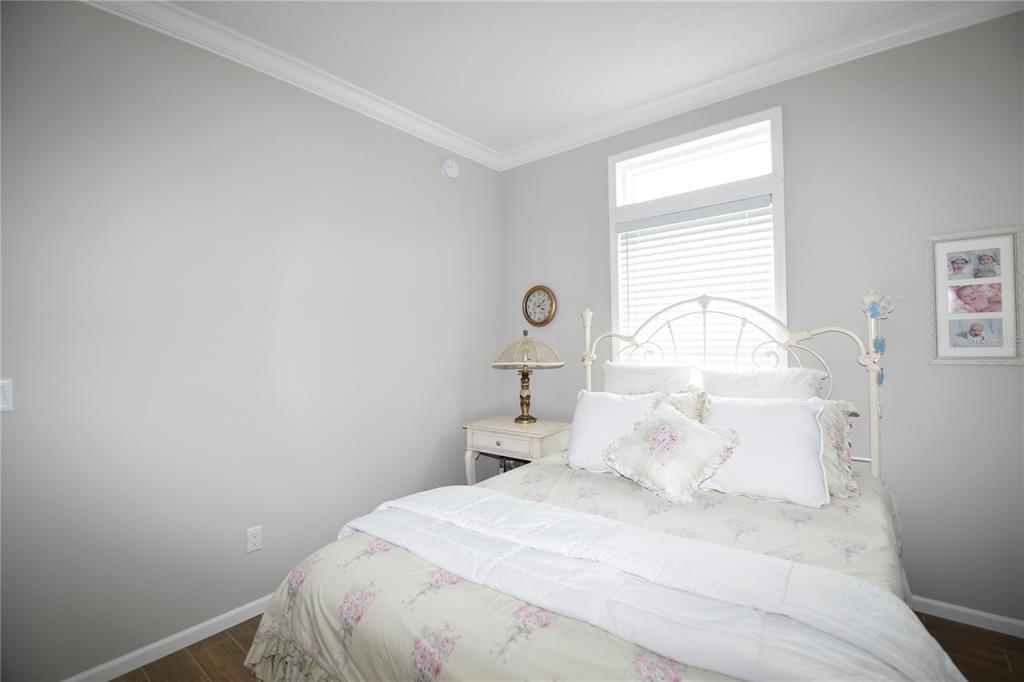 4354 North Manatee Loop, Unit 16A Punta Gorda, FL 33980 - Photo 24 of 33 a bedroom with a bed and a window