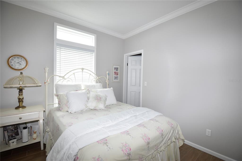4354 North Manatee Loop, Unit 16A Punta Gorda, FL 33980 - Photo 25 of 33 a bedroom with a bed and a window