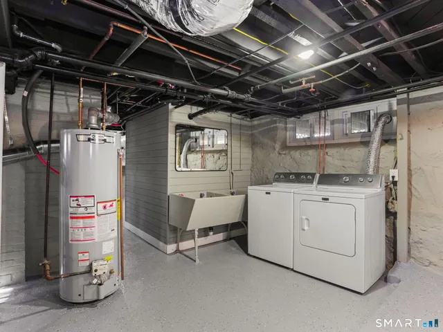 a view of an empty room with wooden roof