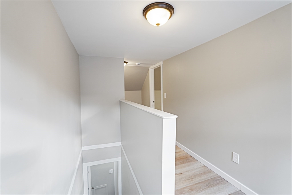 72 Main Street Pepperell, MA 01463 - Photo 13 of 26 a view of hallway with stairs