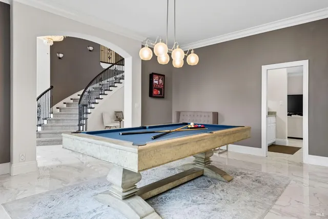 a kitchen with appliances cabinets and a sink