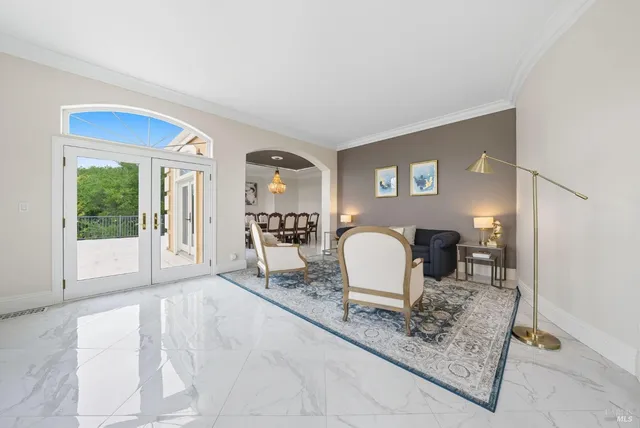 a kitchen with stainless steel appliances granite countertop a sink and a refrigerator
