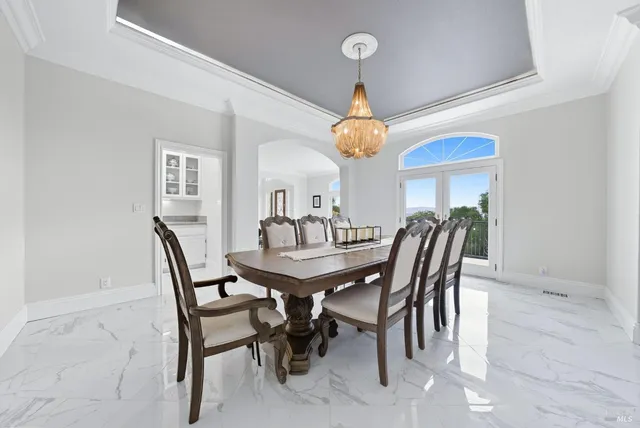 a spacious bathroom with a tub sink shower and mirror