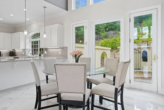 a view of a swimming pool with a patio