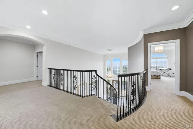 an aerial view of a house with a big yard