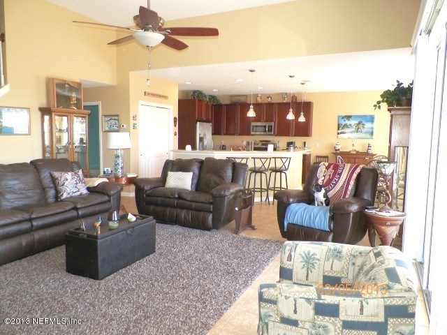 741 Porta Rosa Circle St. Augustine, FL 32092 - Photo 5 of 25 FAMILY ROOM TO KITCHEN
