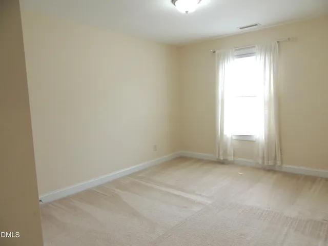 a view of empty room with window