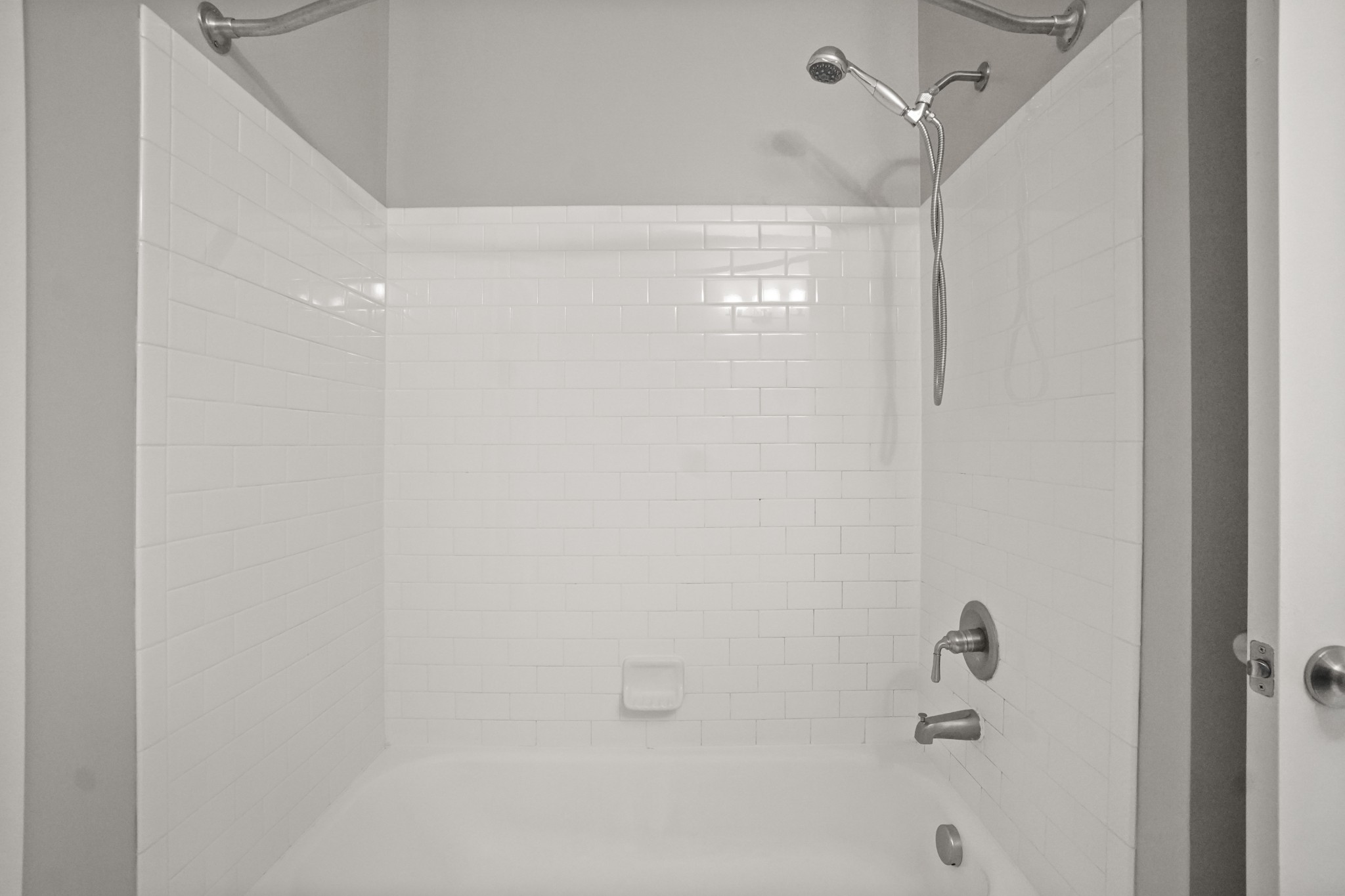 414 Rosedale Avenue, Unit 308 Nashville, TN 37211 - Photo 20 of 26 a bathroom with a shower and a bath tub
