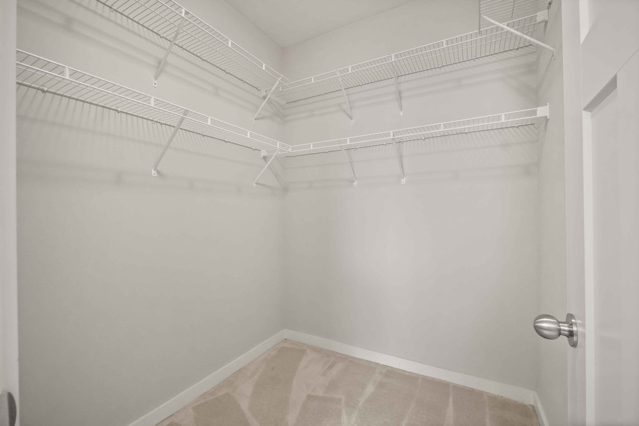 414 Rosedale Avenue, Unit 308 Nashville, TN 37211 - Photo 22 of 26 a view of a room with racks on the wall