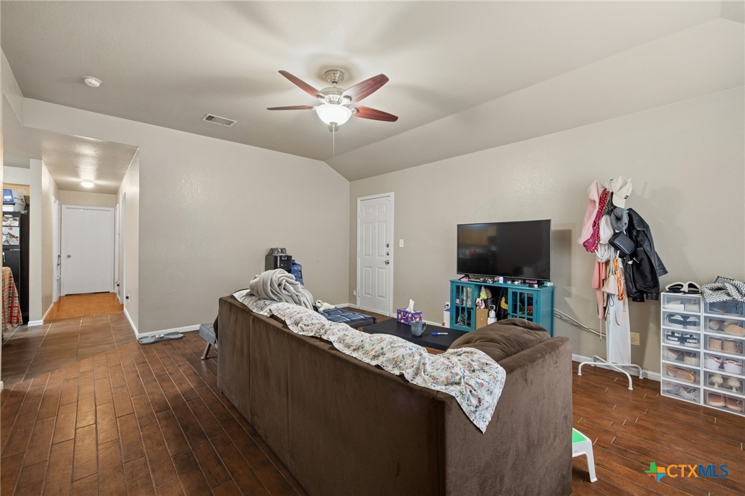 1803 Aztec Trace Harker Heights, TX 76548 - Photo 29 of 42 a living room with furniture and a flat screen tv