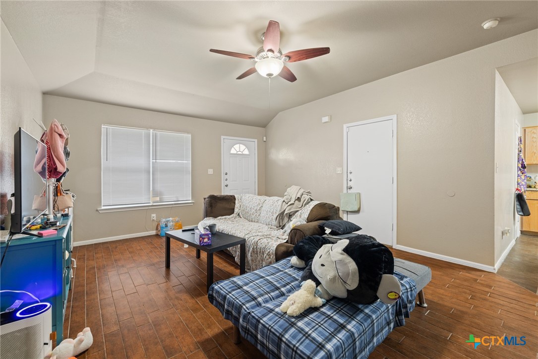 1803 Aztec Trace Harker Heights, TX 76548 - Photo 31 of 42 a living room with furniture and wooden floor