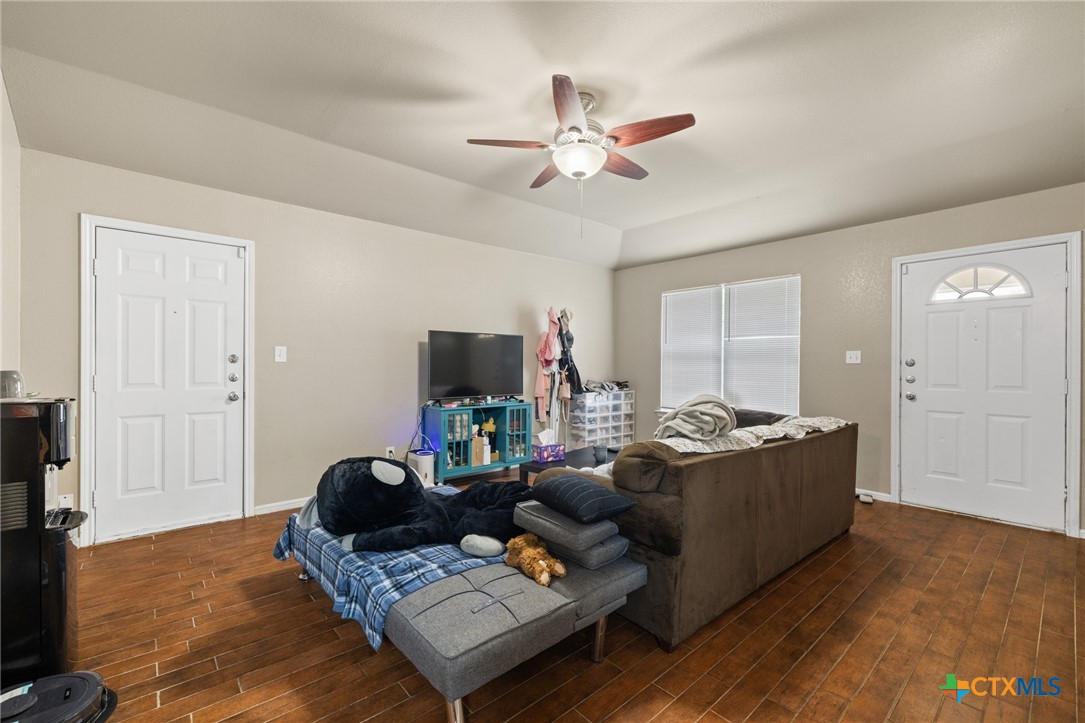 1803 Aztec Trace Harker Heights, TX 76548 - Photo 32 of 42 a living room with furniture and a flat screen tv