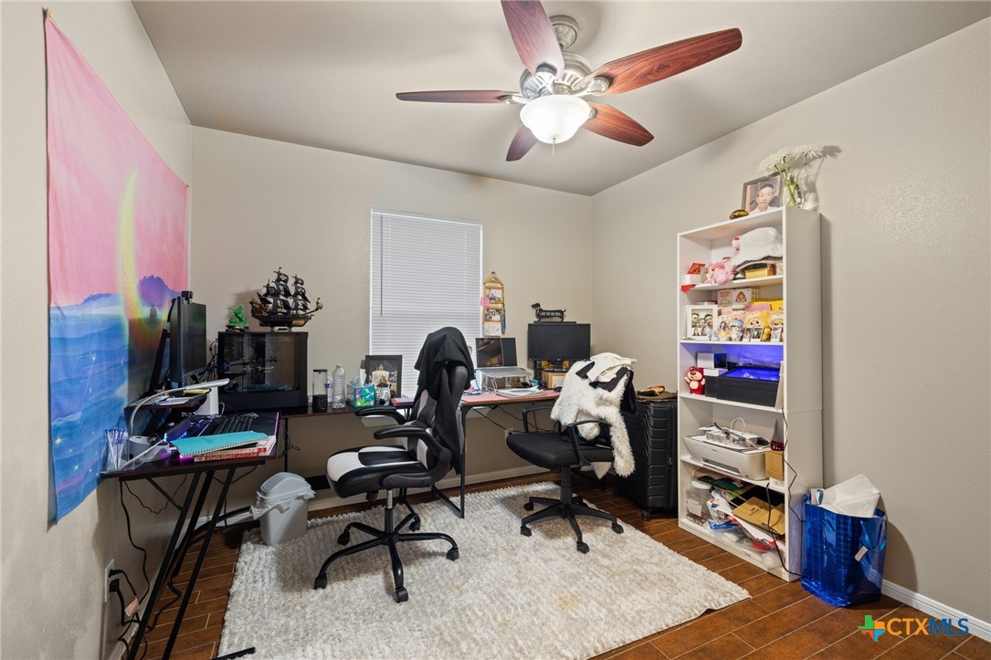 1803 Aztec Trace Harker Heights, TX 76548 - Photo 36 of 42 a view of a workspace with furniture and a window