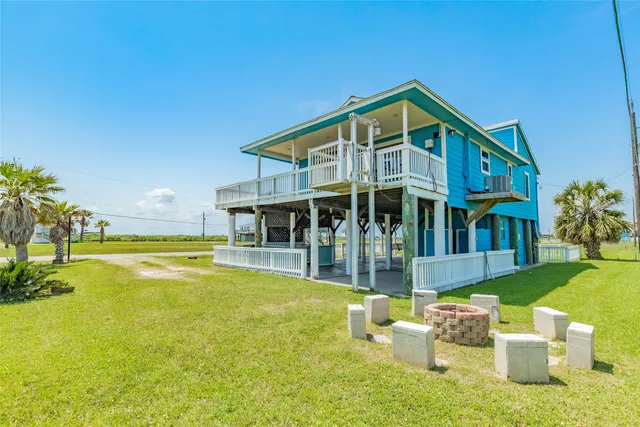a view of swimming pool with seating area