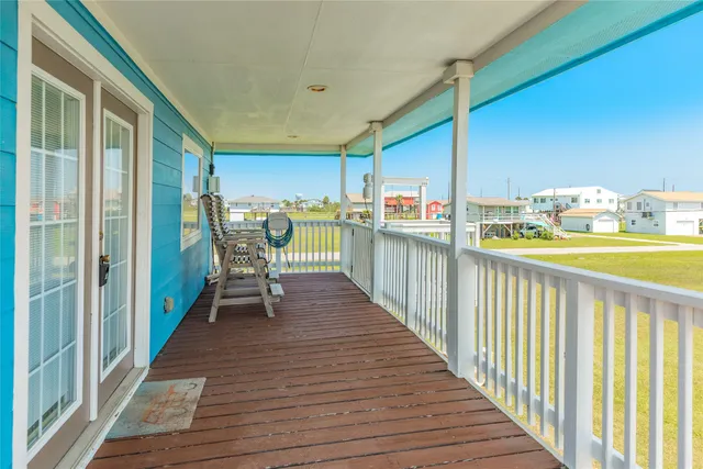 a view of balcony with chairs