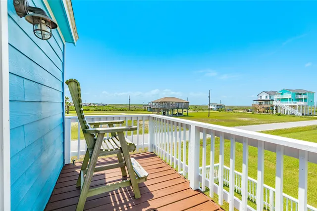 a view of swimming pool with outdoor seating and yard