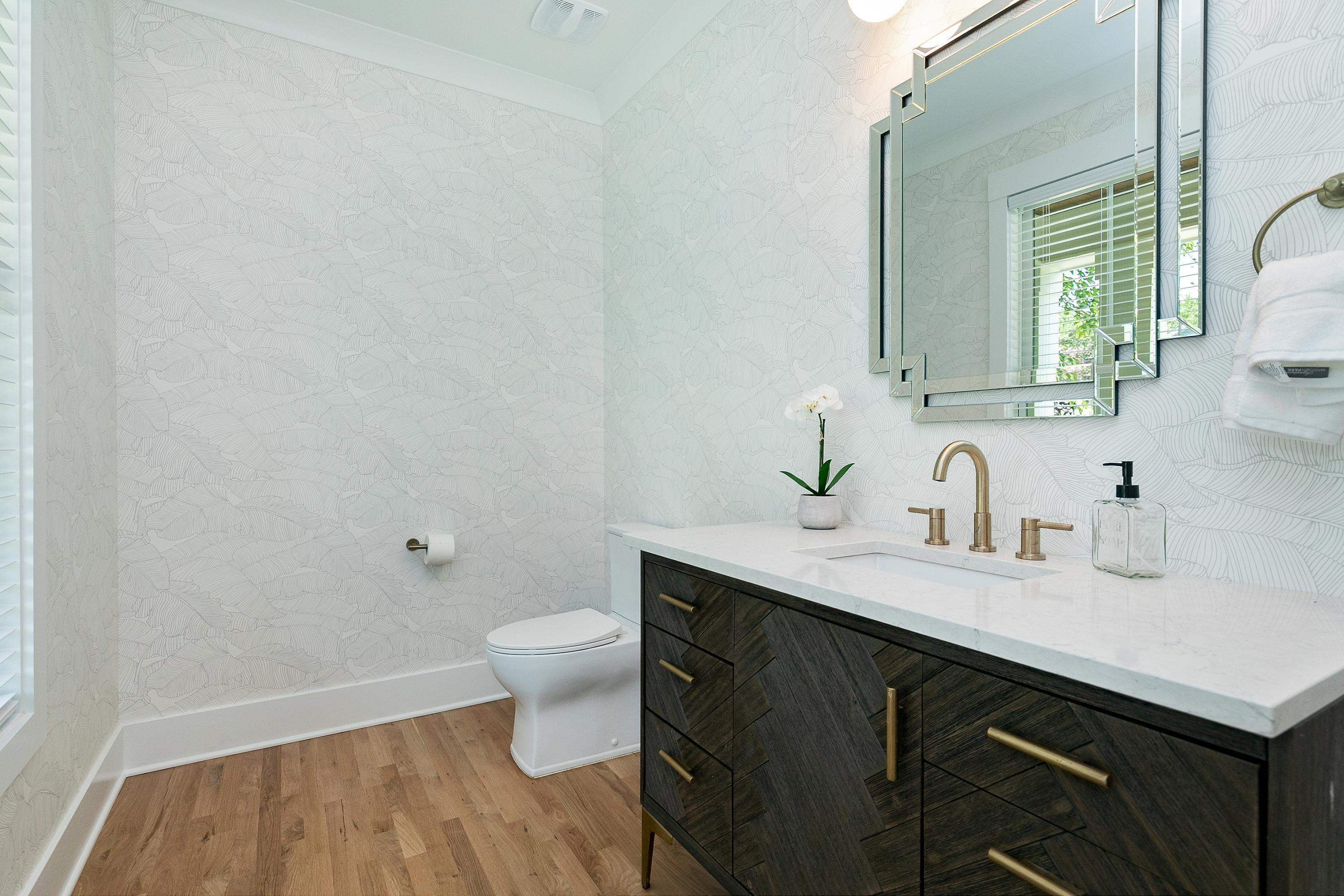 118 Summit Avenue Raleigh, NC 27603 - Photo 11 of 30 a bathroom with a sink and a mirror