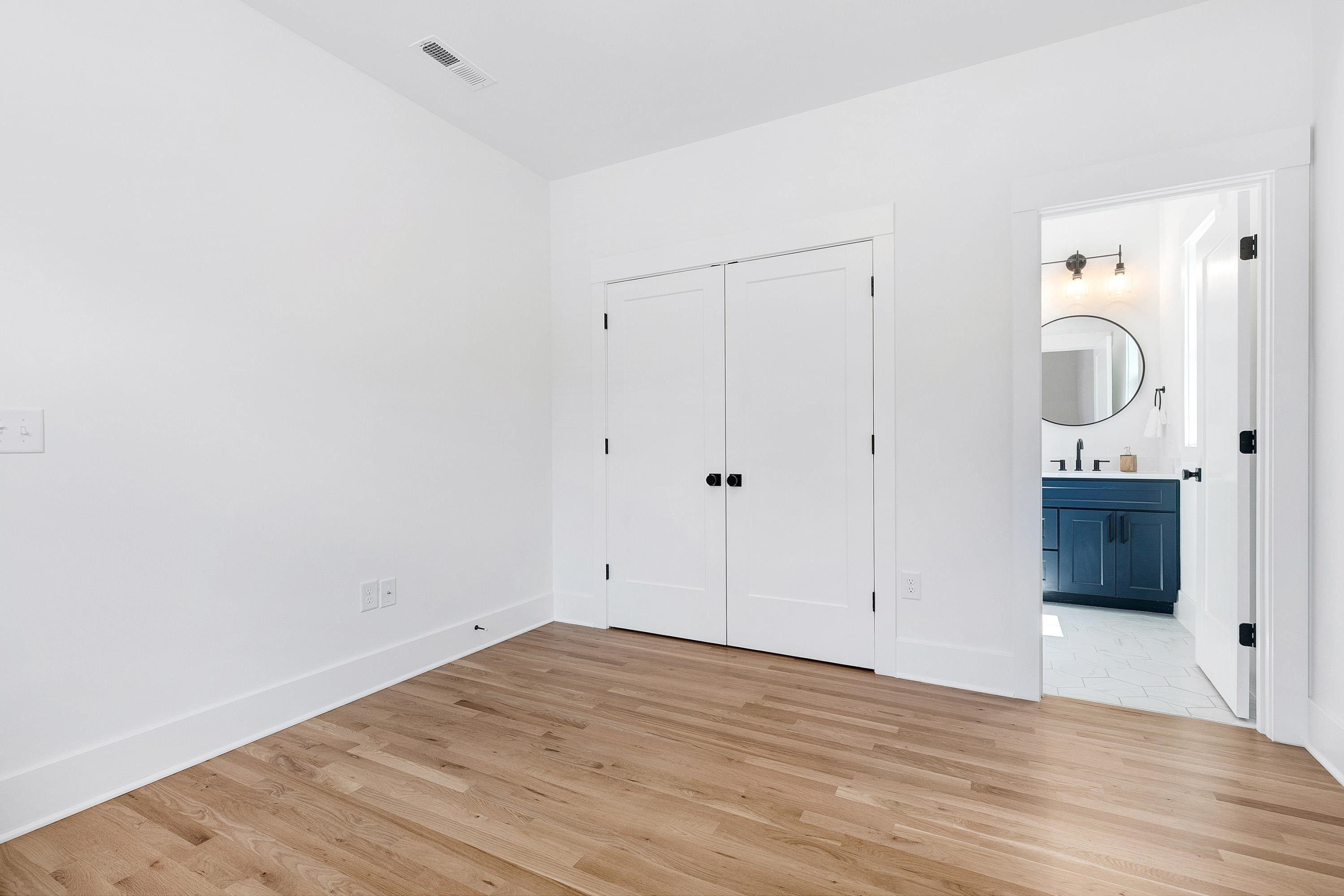 118 Summit Avenue Raleigh, NC 27603 - Photo 16 of 30 a view of a room with wooden floor and sink