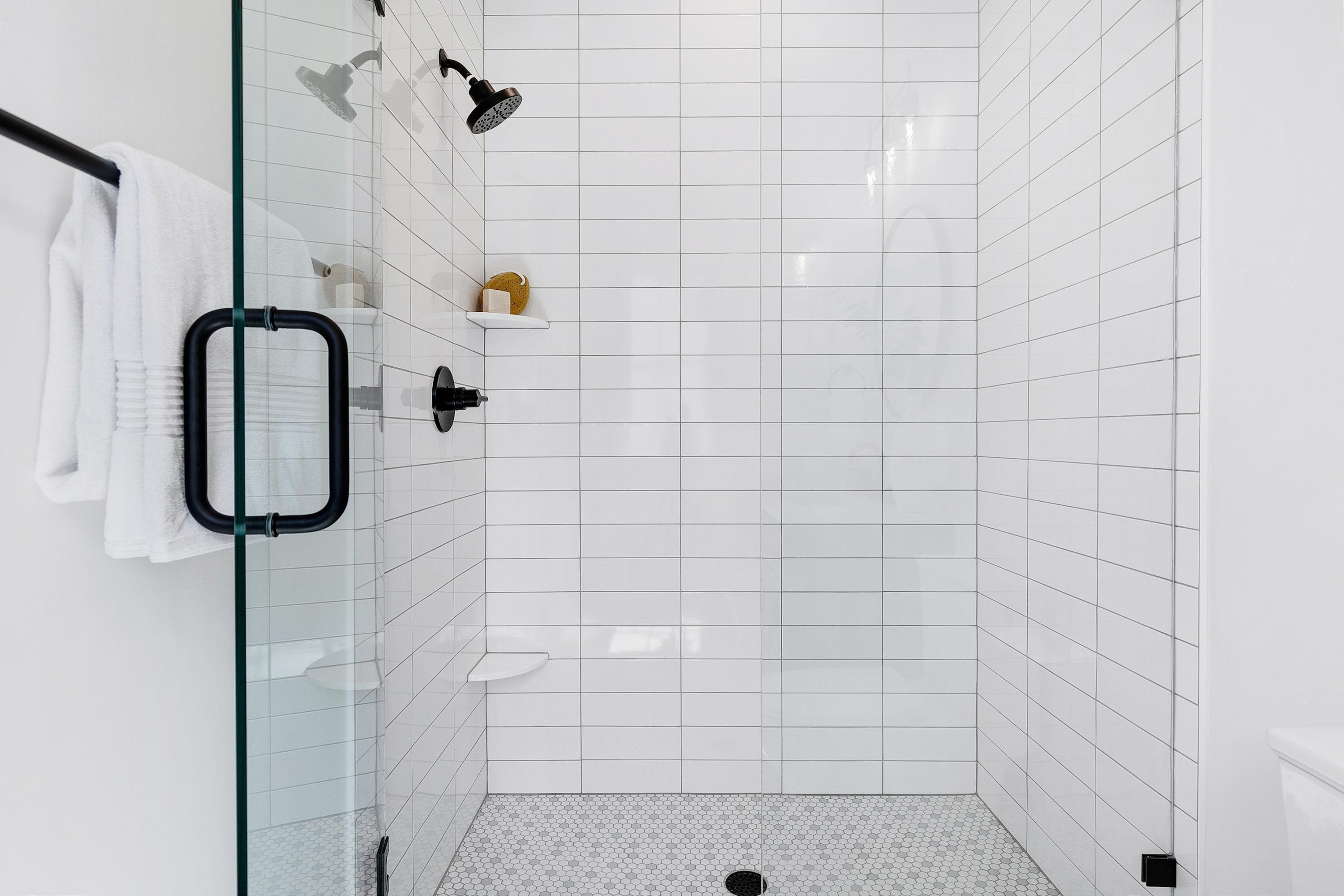 118 Summit Avenue Raleigh, NC 27603 - Photo 17 of 30 a bathroom with a shower