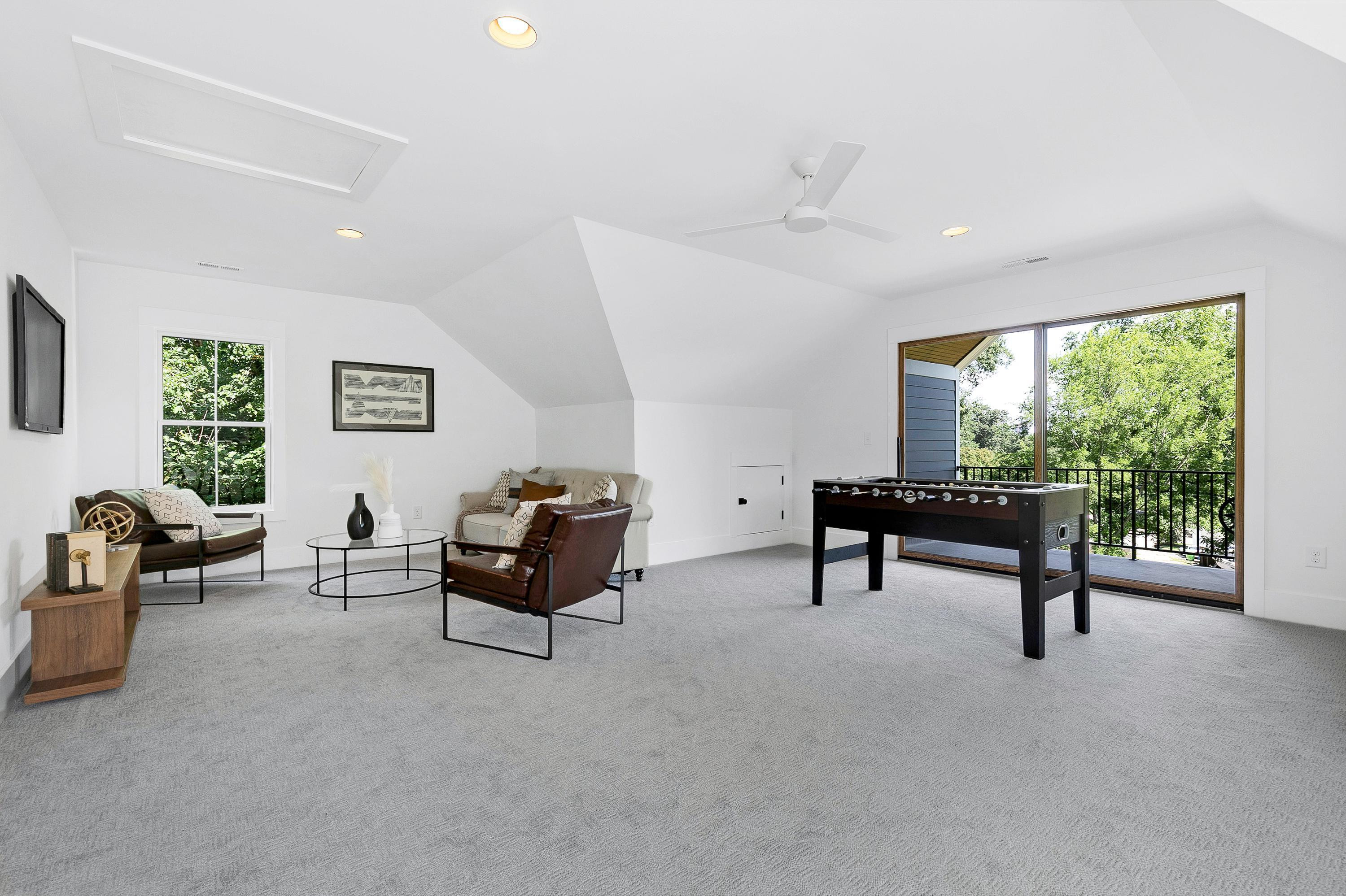 118 Summit Avenue Raleigh, NC 27603 - Photo 22 of 30 a living room with furniture and a window