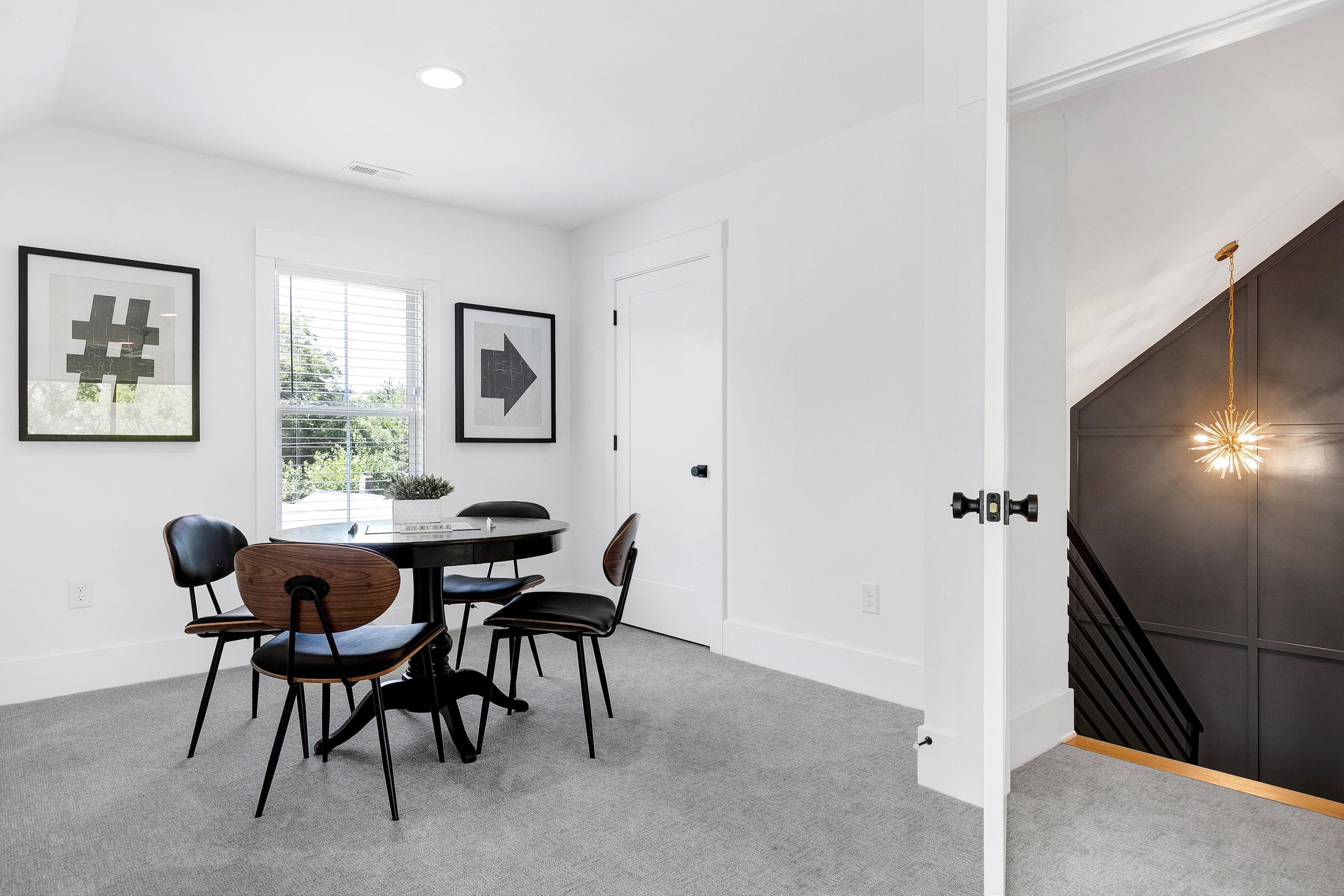 118 Summit Avenue Raleigh, NC 27603 - Photo 24 of 30 a view of a dining room with furniture