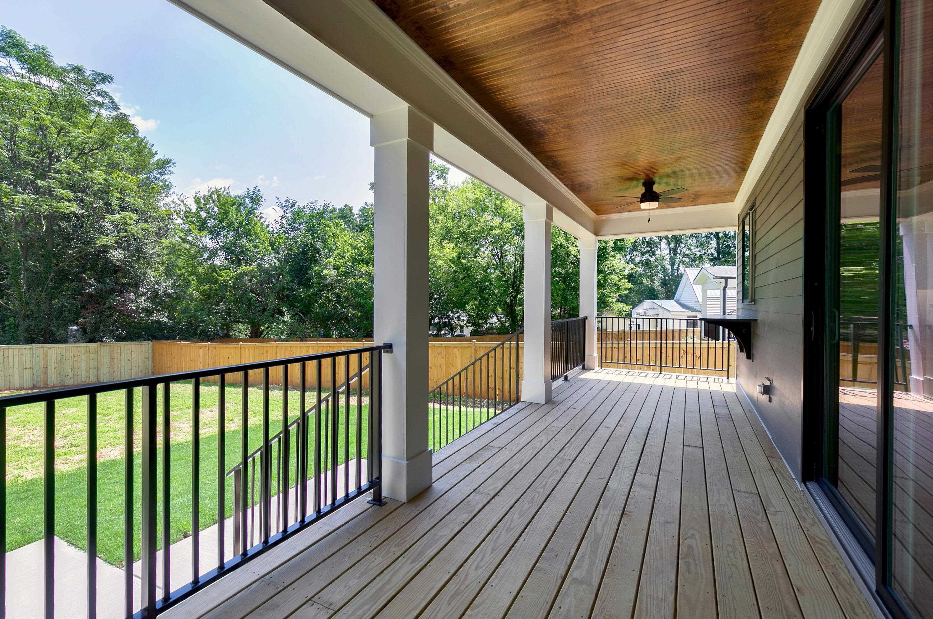 118 Summit Avenue Raleigh, NC 27603 - Photo 28 of 30 a view of balcony with wooden floor