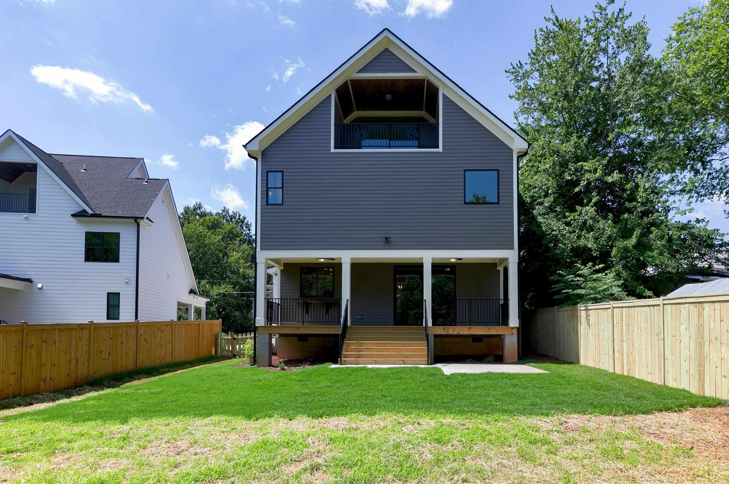118 Summit Avenue Raleigh, NC 27603 - Photo 30 of 30 a view of an house with backyard porch and entertaining space